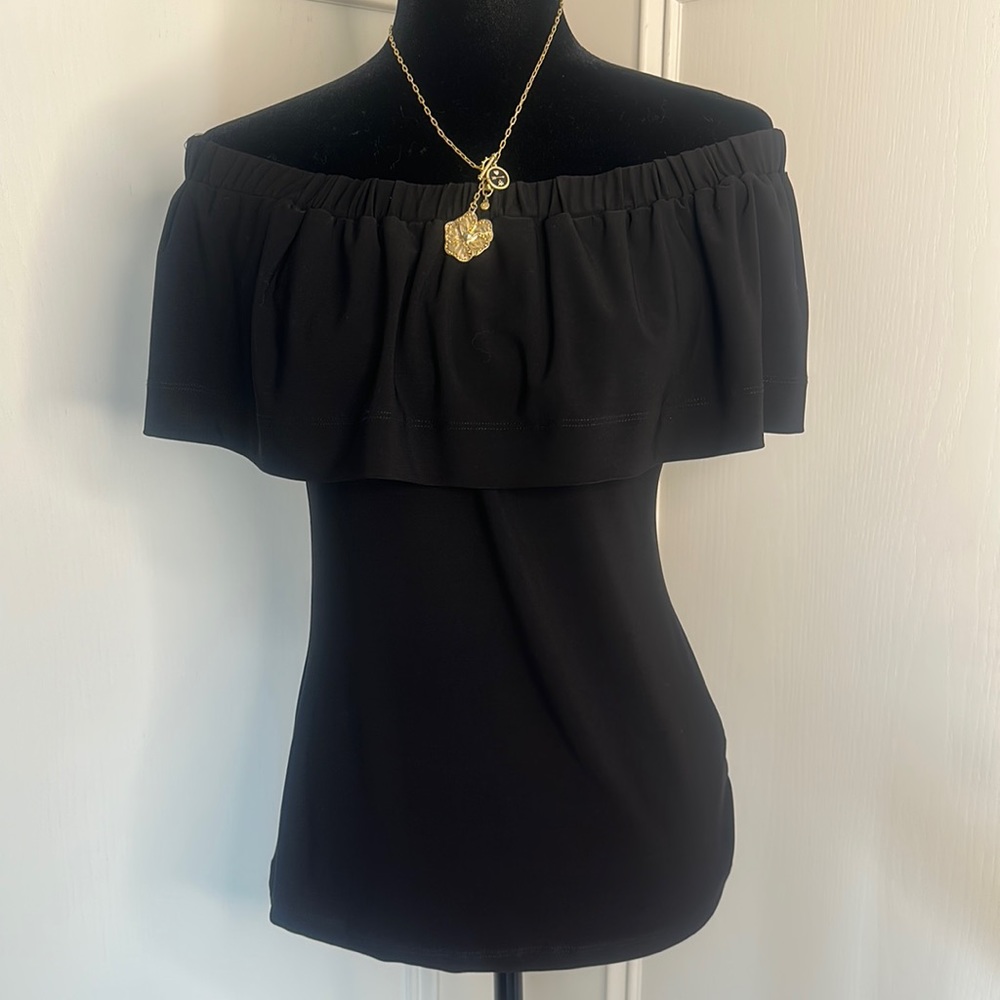 Frank Lyman Design top